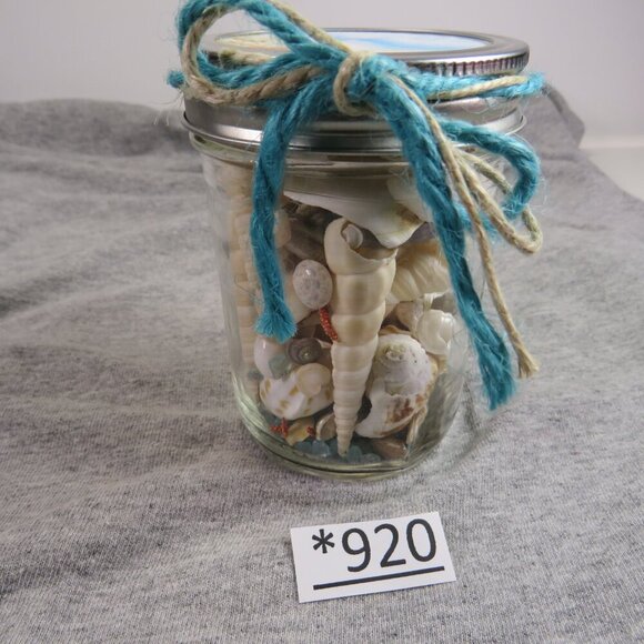 Jar of REAL sea shells and blue sparkly vase filler at bottom - Picture 1 of 9